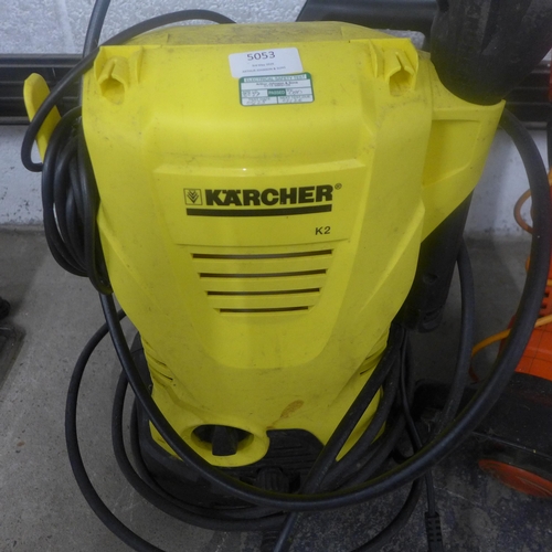 5053 - A Karcher K2 pressure washer, a Black and Decker, 240V strimmer and a Bionaire tower fan