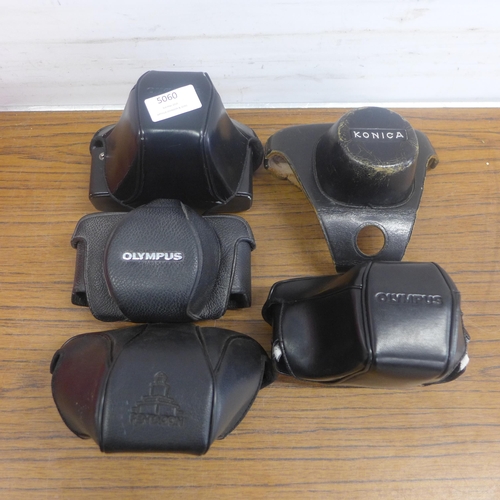 5060 - A collection of assorted SLR and Range Finder camera cases including Olympus, Canon, Minolta, etc.