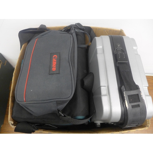 5065 - A collection of assorted camera cases and bags including Canon, Samsonite, etc.