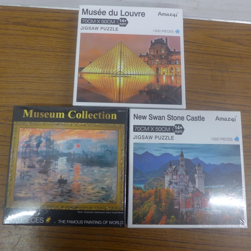 5092 - Four assorted 1000 piece jigsaw puzzles including stone castle, Taj Mahal, Monet Soleil Levante and ... 