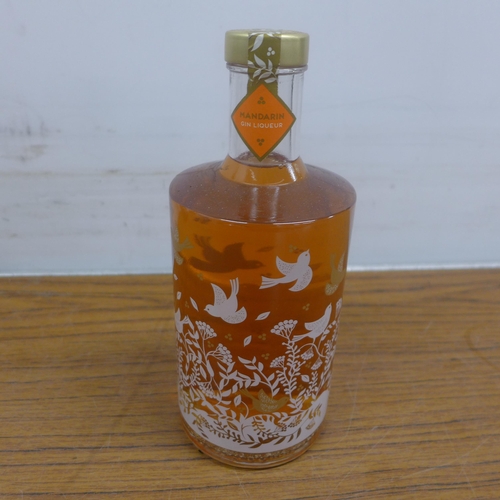 5096 - A bottle of Slane triple casked Irish whiskey and a bottle of mandarin gin liqueur