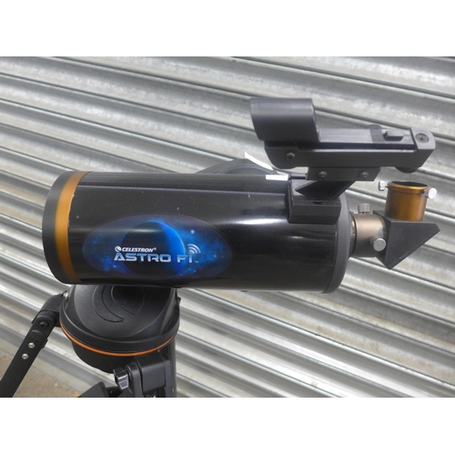 5100 - A Celestron model 22202 Astro F1 telescope with manual, lenses and cap