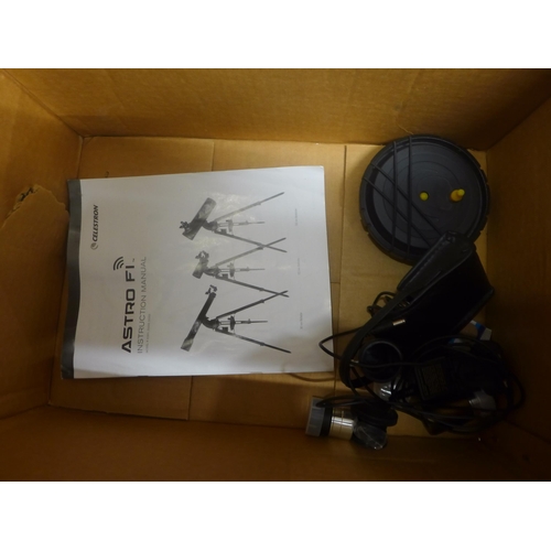 5100 - A Celestron model 22202 Astro F1 telescope with manual, lenses and cap