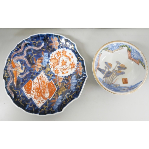 2185 - A collection of mixed oriental blue and white pottery to include vase, teapot, bowl and plate.