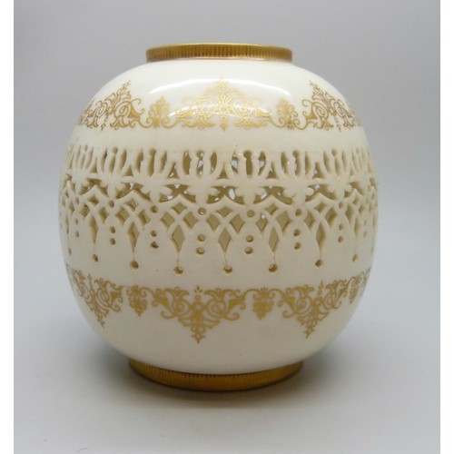 2030 - A Royal Worcester ovoid reticulated porcelain vase, with gilt decoration on an ivory ground, by Geor...
