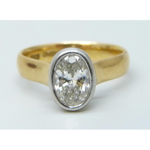 7018 - A 22ct gold diamond solitaire ring, set with an oval cut diamond, approximately 1.5ct diamond weight...