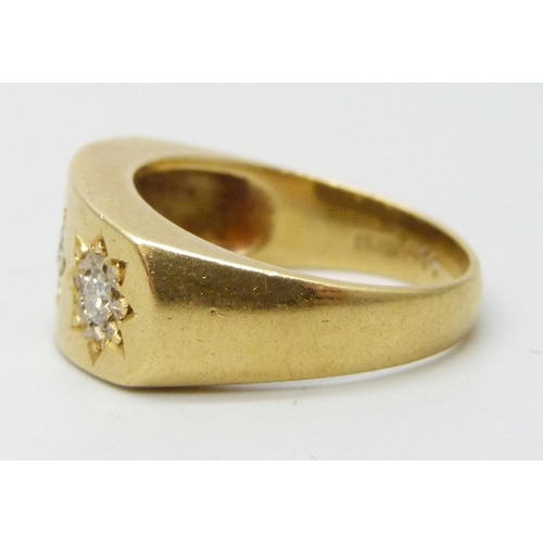 7001 - An 18ct yellow gold three stone diamond ring, 8.4g, P