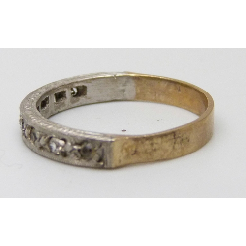 7015 - A 9ct gold and silver half eternity ring