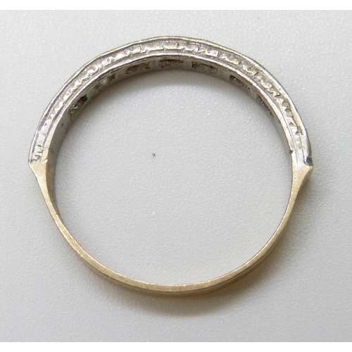 7015 - A 9ct gold and silver half eternity ring