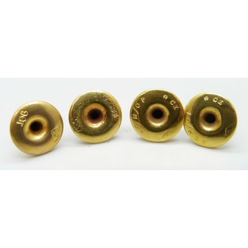 7020 - A cased set of 9ct gold shirt studs, 2.6g