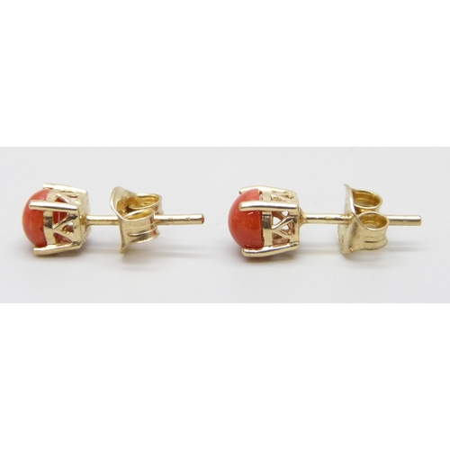 7027 - A pair of 9ct gold Mediterranean coral stud earrings