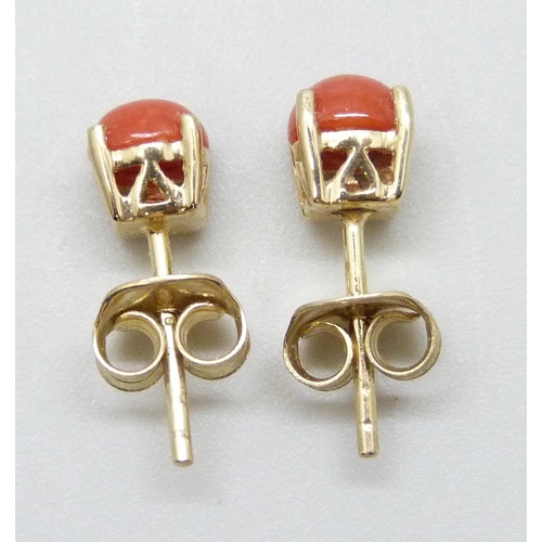 7027 - A pair of 9ct gold Mediterranean coral stud earrings