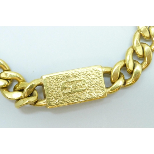 7035 - Franklin mint gold plated gents bracelet and a Michael Kors bracelet