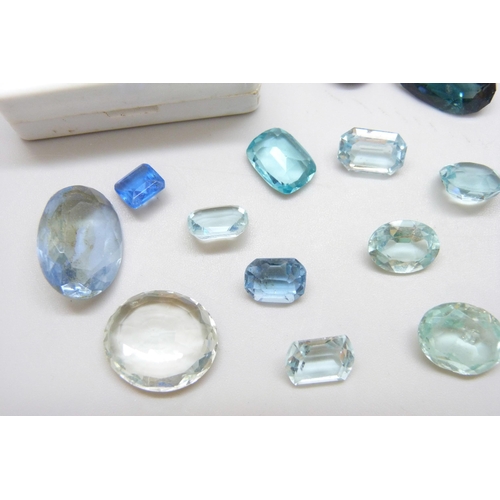 7046 - A quantity of loose blue gemstones including sapphire