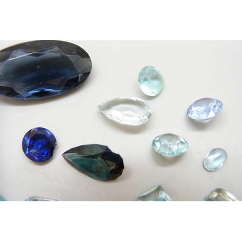 7046 - A quantity of loose blue gemstones including sapphire