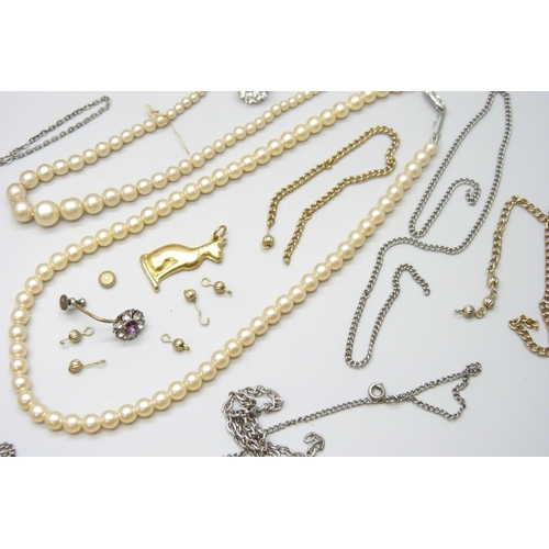 7085 - A collection of costume jewellery, a Dupont pen case and assorted loose gemstones including ruby etc... 