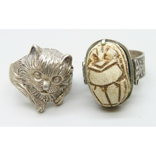 7096 - A silver cat ring, a Mexican abalone tortoise brooch, an Egyptian scarab ring and a dichroic glass p... 