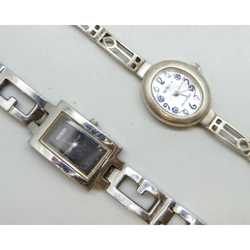 7109 - Three silver bangles, a silver McIntosh wristwatch and other Guess watch