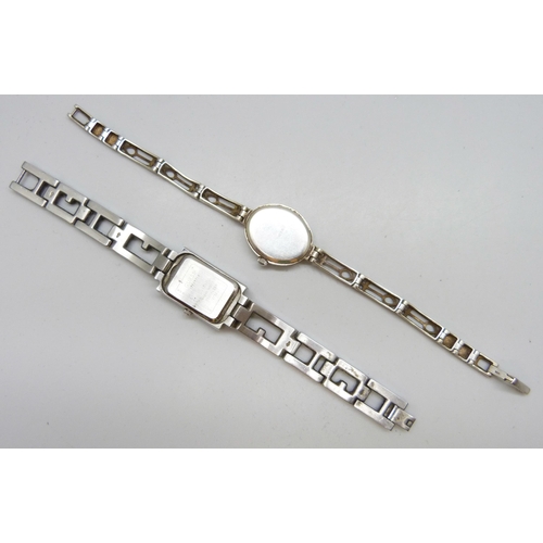 7109 - Three silver bangles, a silver McIntosh wristwatch and other Guess watch