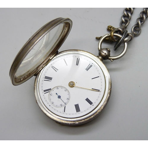 7115 - A silver open face pocket watch on a silver plated Albert chain
