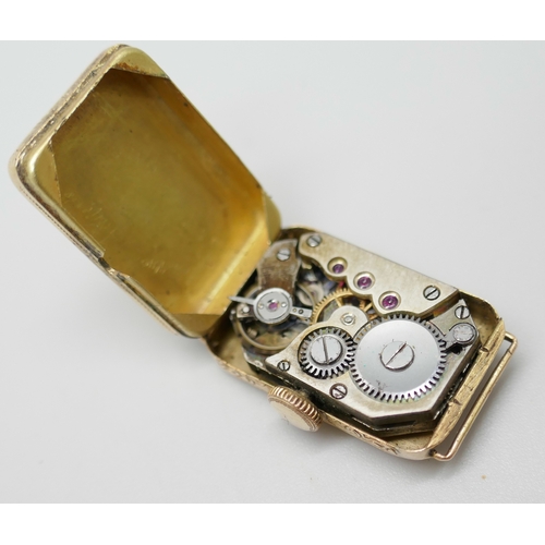 7018E - An Art Deco French 14ct yellow gold wristwatch head, 6.9g, 24mm x 15mm x 5mm