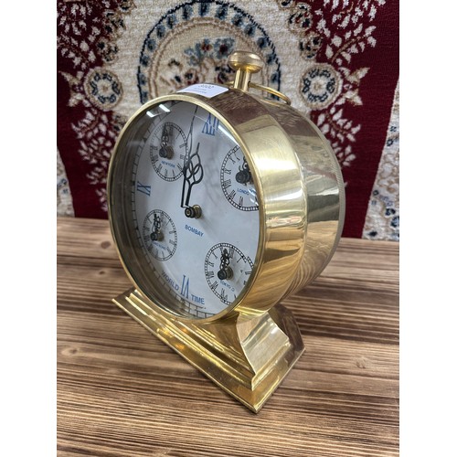 3010 - A gold effect multi dial mantel clock