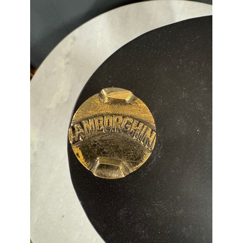 3011 - An oil can bearing the Lamborghini inscription