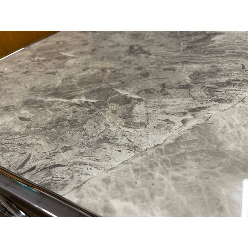 3046 - A Vanquish nest of two tables with chrome base *This lot is subject to VAT