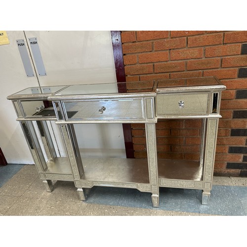 3053 - A silver mirrored 3 drawer console table