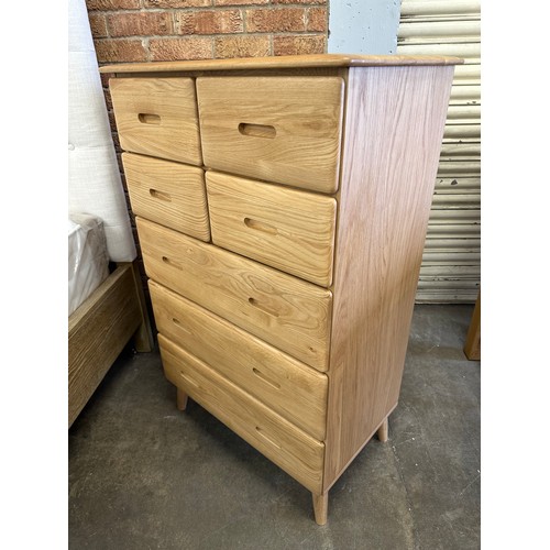3062 - An oak Malmo 4 over 3 chest of drawers