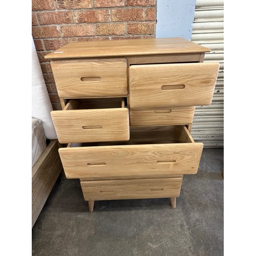 3062 - An oak Malmo 4 over 3 chest of drawers