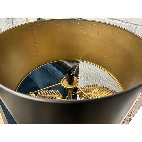3068 - A black and gold effect leaf floor lamp