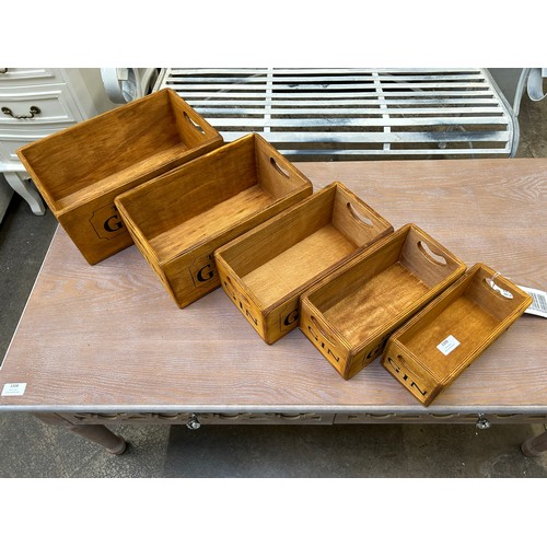 3082 - A set of 5 waxed gin graduated boxes