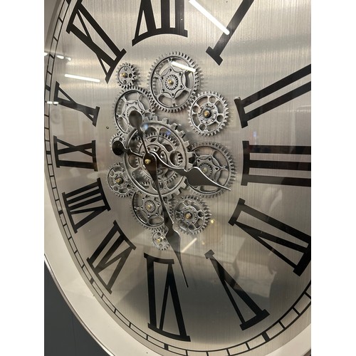 3089 - A oval moving gears clock