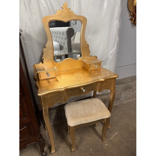 3104 - A gold leaf effect dressing table and stool