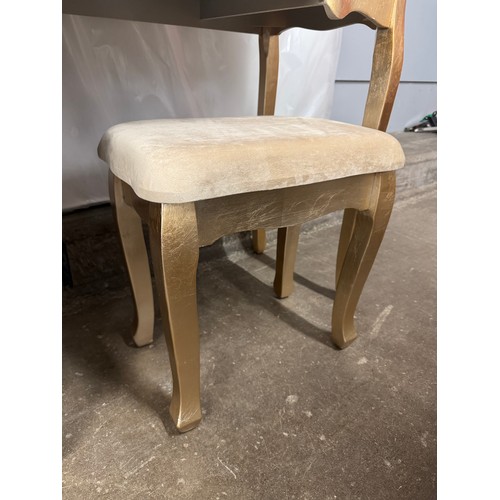 3104 - A gold leaf effect dressing table and stool
