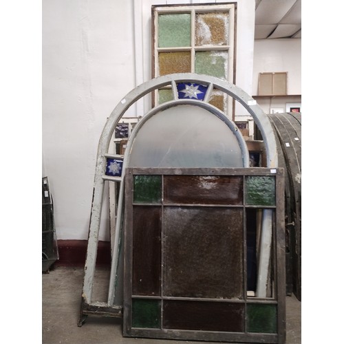 Twelve assorted leaded stained glass panels and windows, various sizes ...