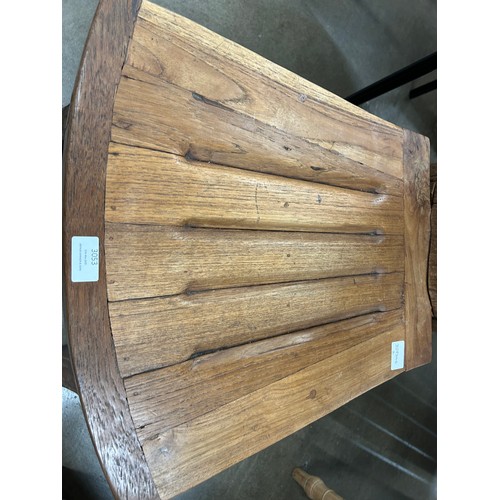 3179 - A rustic tree trunk chair