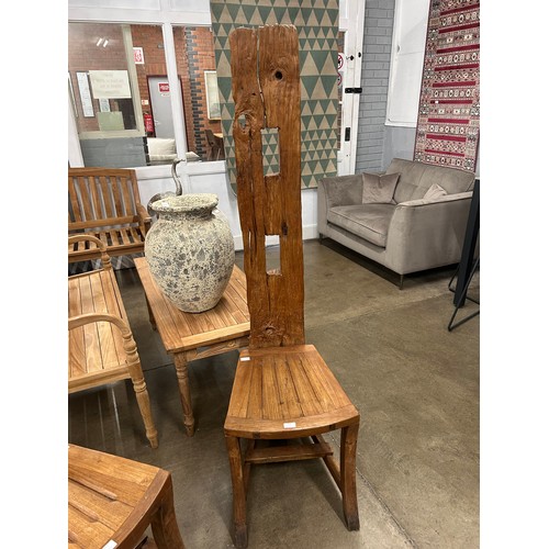 3180 - A rustic tree trunk chair