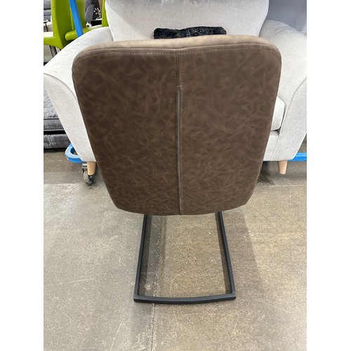 3192 - A pair of Meazan brown dining chairs