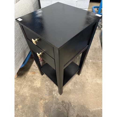 3209 - A pair of black two drawer bedside tables