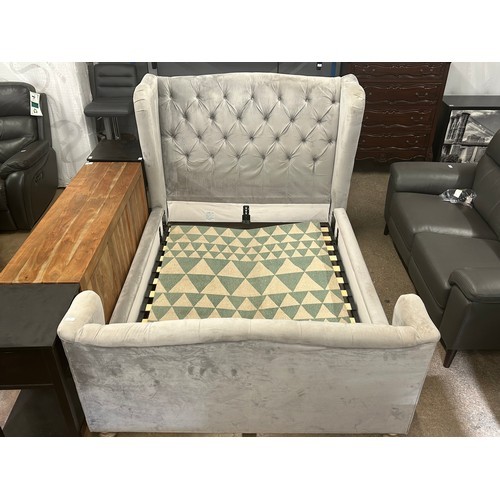 3230 - A grey velvet buttoned double bedframe