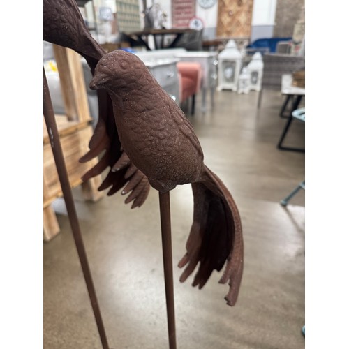 3100 - A set of two decorative birds on stands