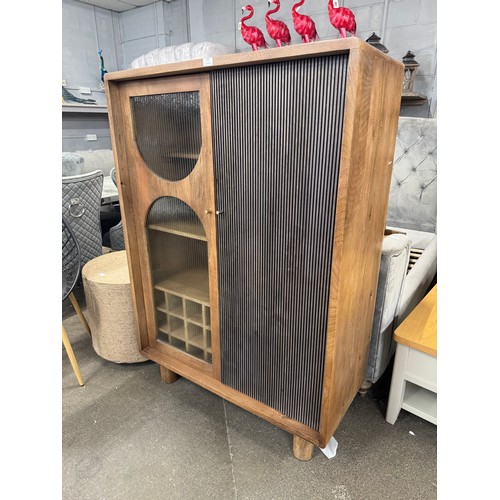 3237 - An Iconic highboard drinks cabinet *This lot is subject to VAT