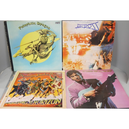 2090 - A collection of approximately 30 rock LP records including Iron Maiden, Black Sabbath, Eagles
