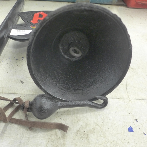 5063 - A cast metal AC/DC Hells bells wall mountable bell  *This lot is subject to VAT