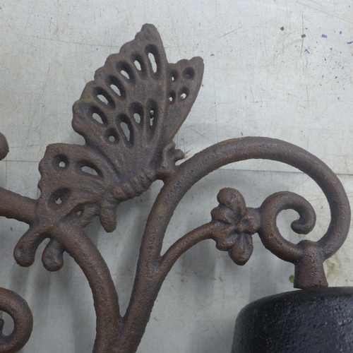 5064 - A cast metal wall mountable butterfly bell  *This lot is subject to VAT