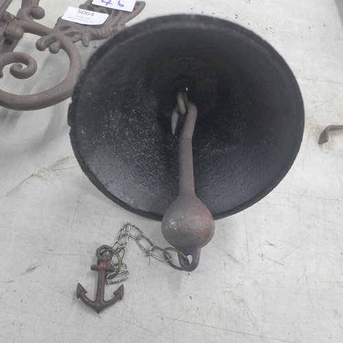 5064 - A cast metal wall mountable butterfly bell  *This lot is subject to VAT