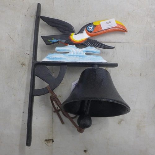 5066 - A cast metal wall mountable toucan bell  *This lot is subject to VAT