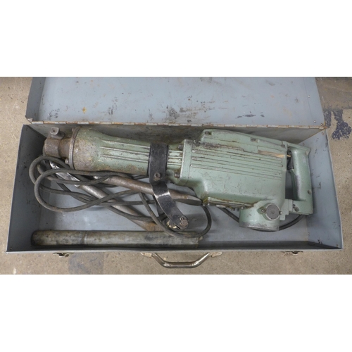 5068 - A cased Bachmayr PH65A 110v demolition breaker